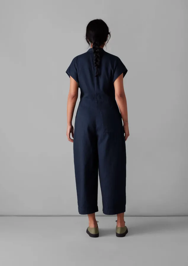 cross_front_indigo_twill_jumpsuit_13.webp Jumpsuits | Trousers-TOAST Cross Front Twill Jumpsuit Indigo