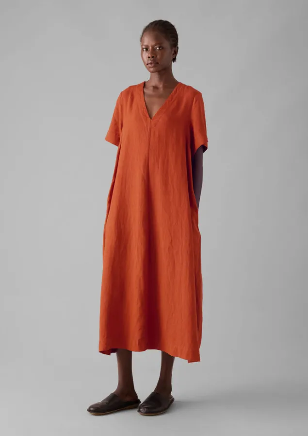 garment_dyed_linen_vneck_dress_9-1.webp Linen | Loungewear-TOAST Garment Dyed Linen V-Neck Dress RooibosRed