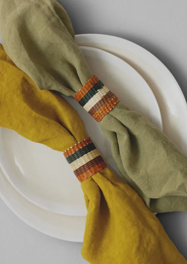 hand_woven_iraca_napkin_rings_4-2.webp Textiles | Kitchen-TOAST Hand Woven Iraca Napkin Rings Sand/Multi